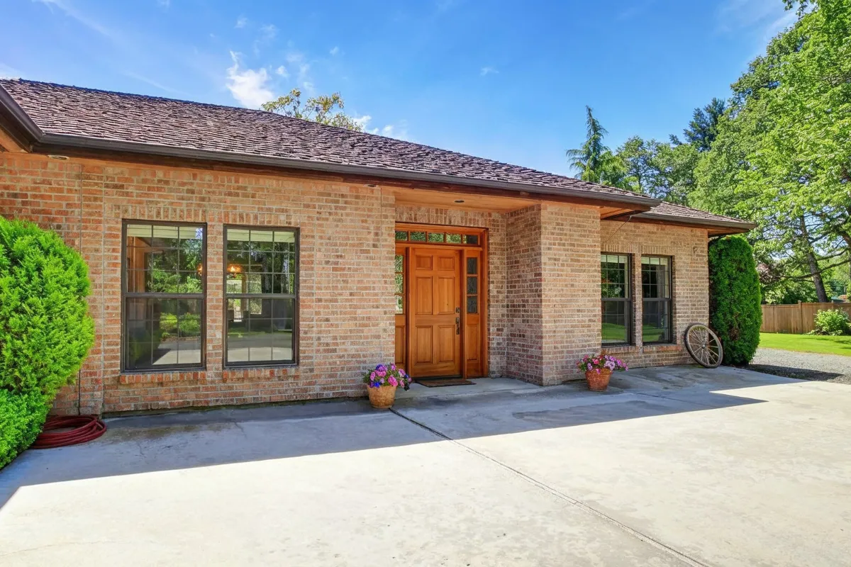 ADU garage conversion project in Los Angeles with updated exterior, private entry potential, driveway access, and converted living space design