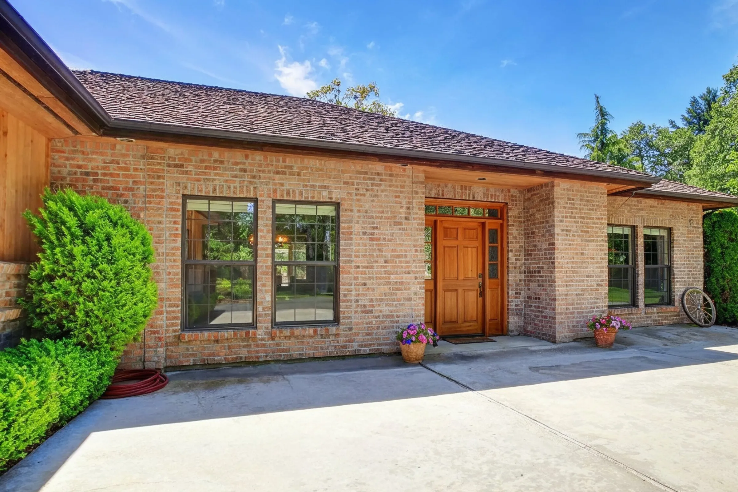 After ADU garage conversion project in Los Angeles with converted living space, updated brick exterior, residential windows, private entry potential, and improved property function