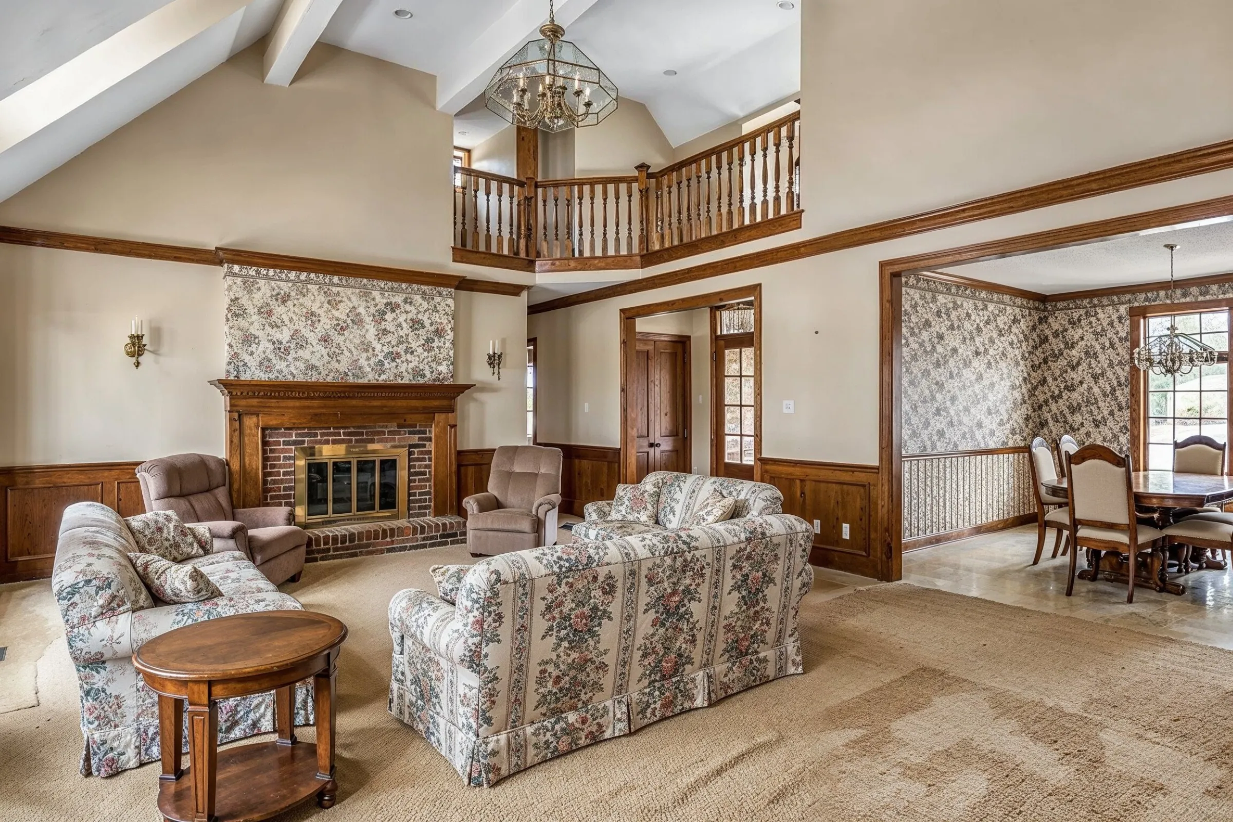 Outdated living room before Los Angeles home remodeling with older finishes and limited visual flow