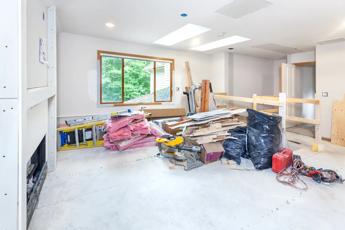 Full home remodeling in Los Angeles with interior construction, open living space renovation, skylight updates, and materials prepared for rebuild