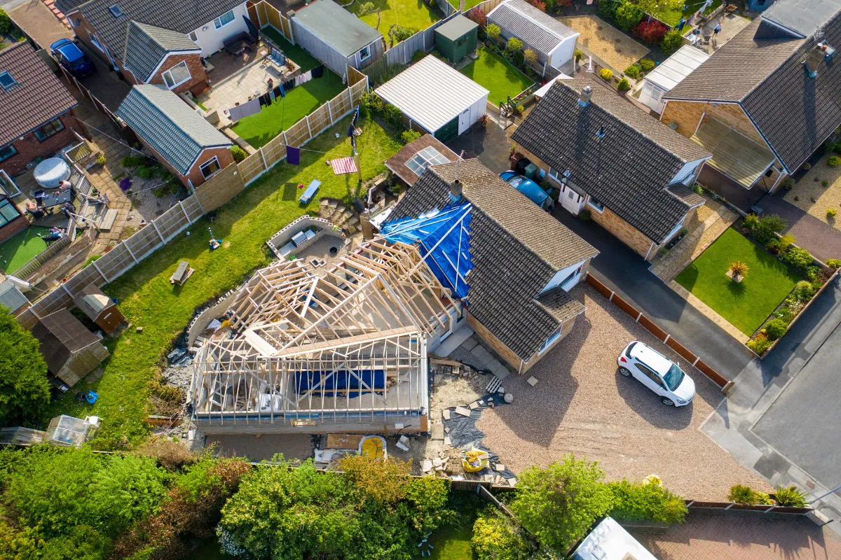 Room addition construction in Los Angeles with wood framing, roof structure, and home expansion work designed to create more usable living space