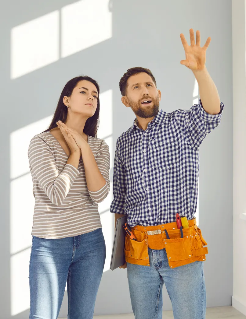Los Angeles remodeling permits and planning consultation with contractor explaining project scope, layout options, permit considerations, and renovation preparation to homeowner